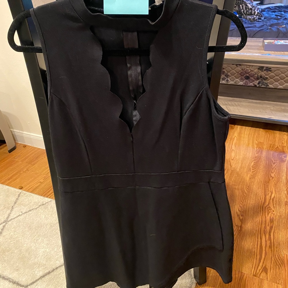 Black romper with scalloped plunging neckline